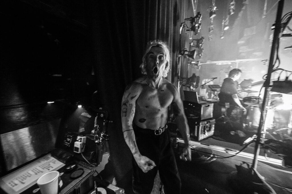Judah flexes back stage during Judah and The Lion Concert at Blue Note.