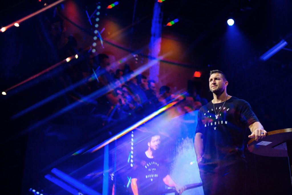 Tim Tebow on stage during speech in Columbia, Missouri