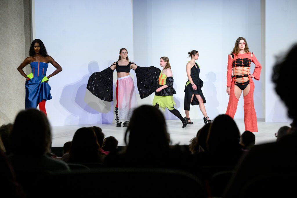 models walking during the 80th Stephens College Student fashion Show columbia mo